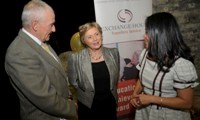 Ms. Frances Fitzgerald TD, Minister for Children and Youth Affairs with John Paul Hanley, Board Member and Heydi Foster, Director