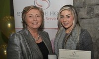 Natalie McDonagh receives her Award from Minister Fitzgerald